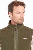 Olive fleece waistcoat with zip placket and Barbour patch on chest.