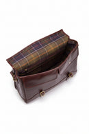Barbour leather briefcase open, showing plaid-lined interior pockets and flap closure