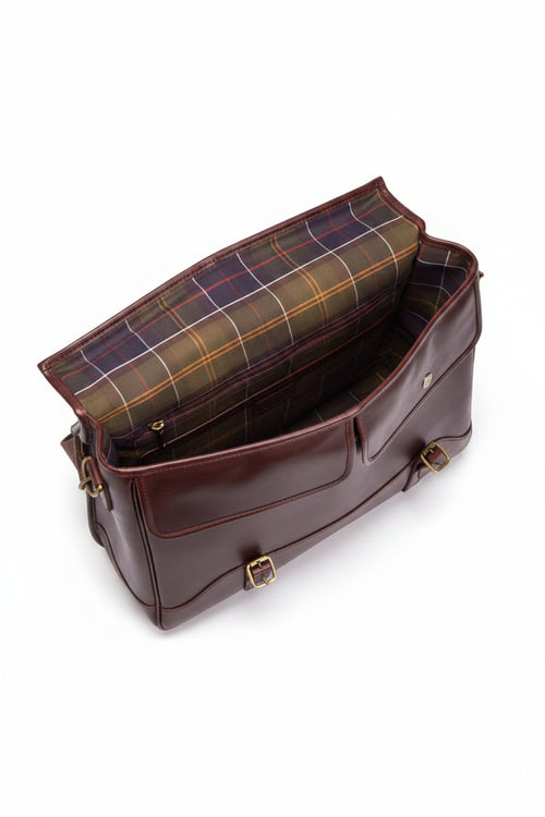 Barbour leather briefcase open, showing plaid-lined interior pockets and flap closure