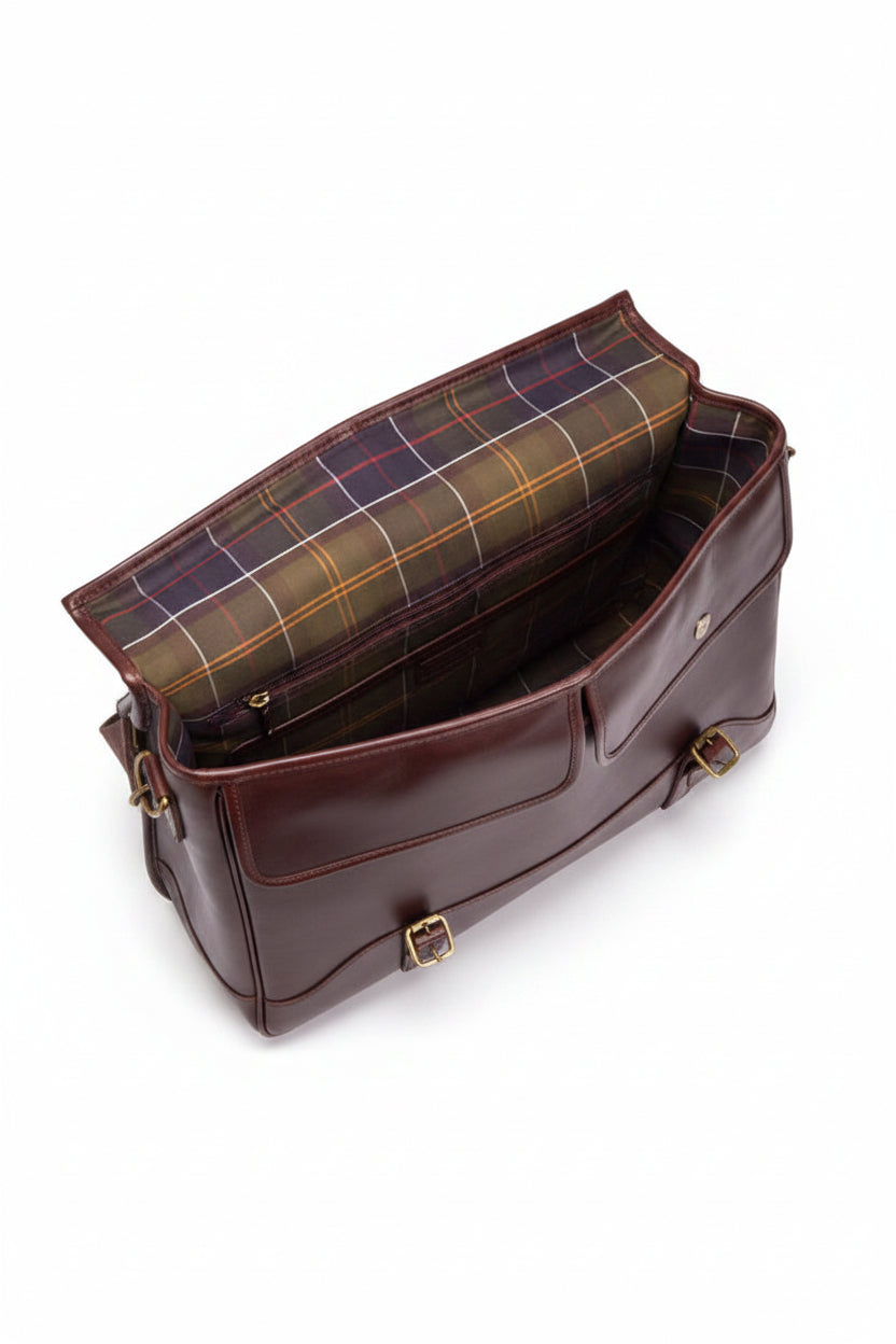 Barbour leather briefcase open, showing plaid-lined interior pockets and flap closure