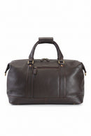 A dark brown leather duffel bag with dual top handles, a front zippered pocket, and brass-tone hardware, shown against a plain white background.