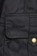 Barbour dark lightweight jacket fabric label patch on pocket flap with snap buttons