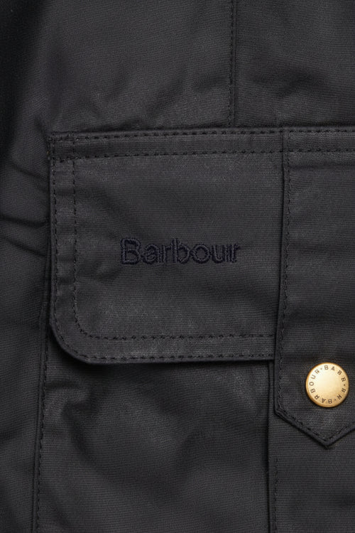 Barbour dark lightweight jacket fabric label patch on pocket flap with snap buttons