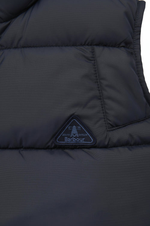 Navy quilted gilet with Barbour logo patch and quilted panel seams