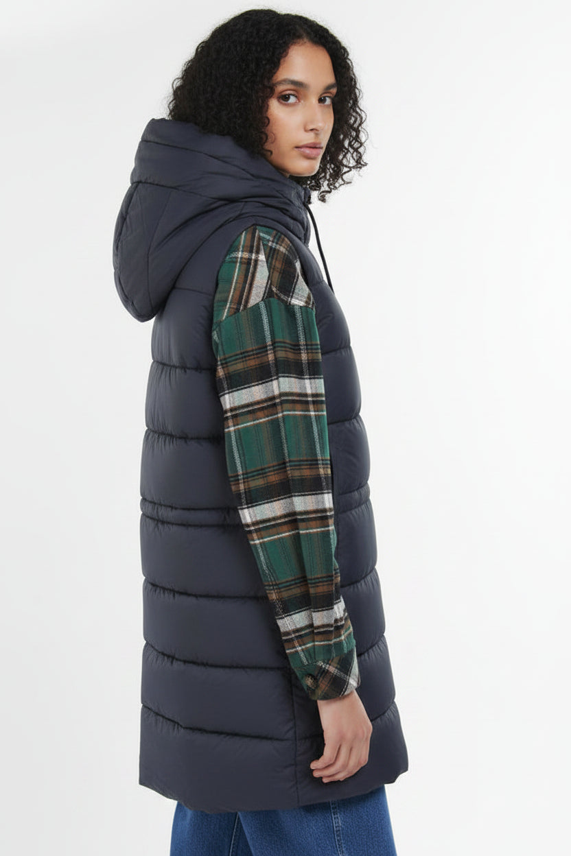 Navy quilted hooded gilet with button front, styled with plaid sleeves