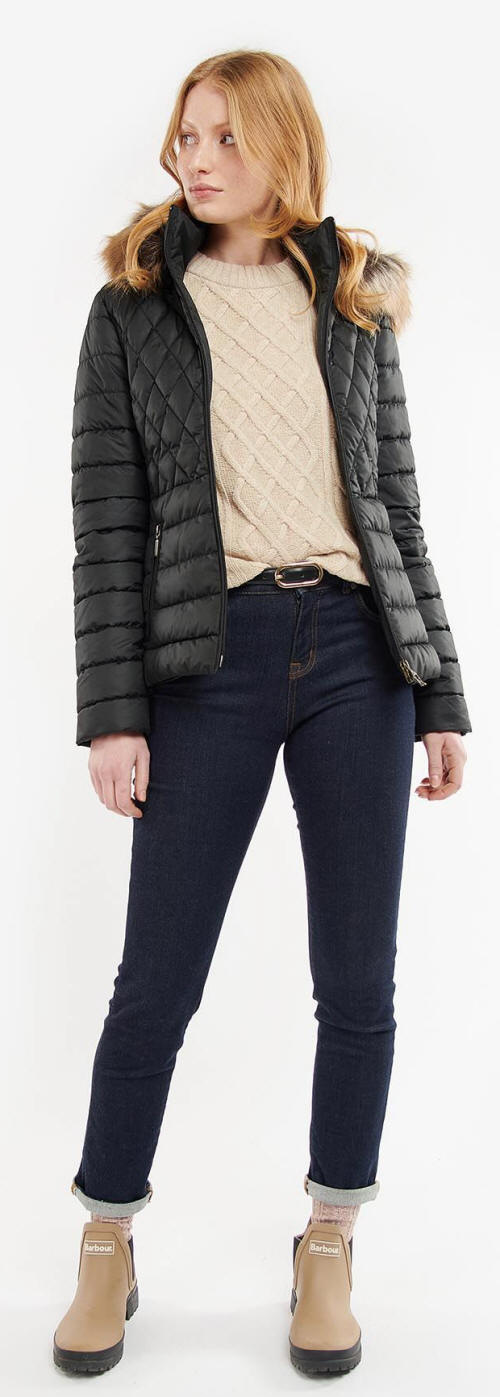 Black quilted jacket worn with hood and front zip closed