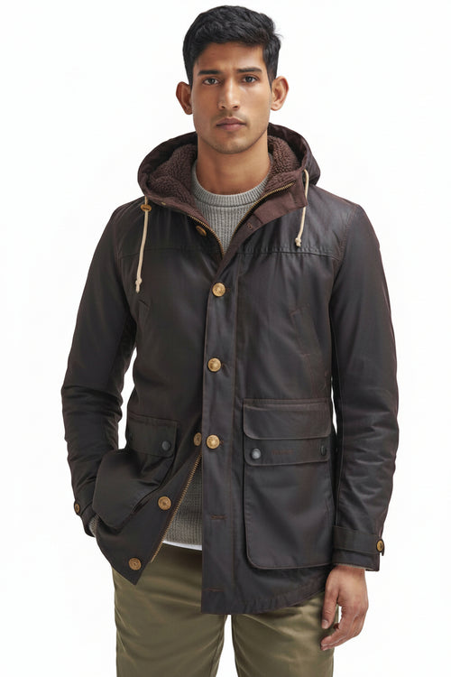 Men's dark wax parka with hood, snap button front, and flap pockets at waist.