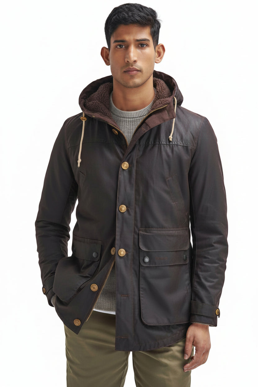 Men's dark wax parka with hood, snap button front, and flap pockets at waist.