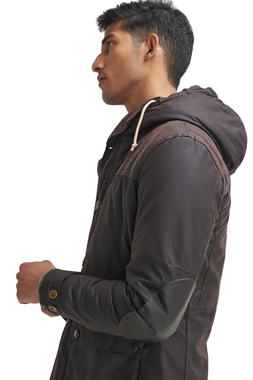 Men's dark wax parka sleeve with button cuff and shoulder drawstring hood detail.