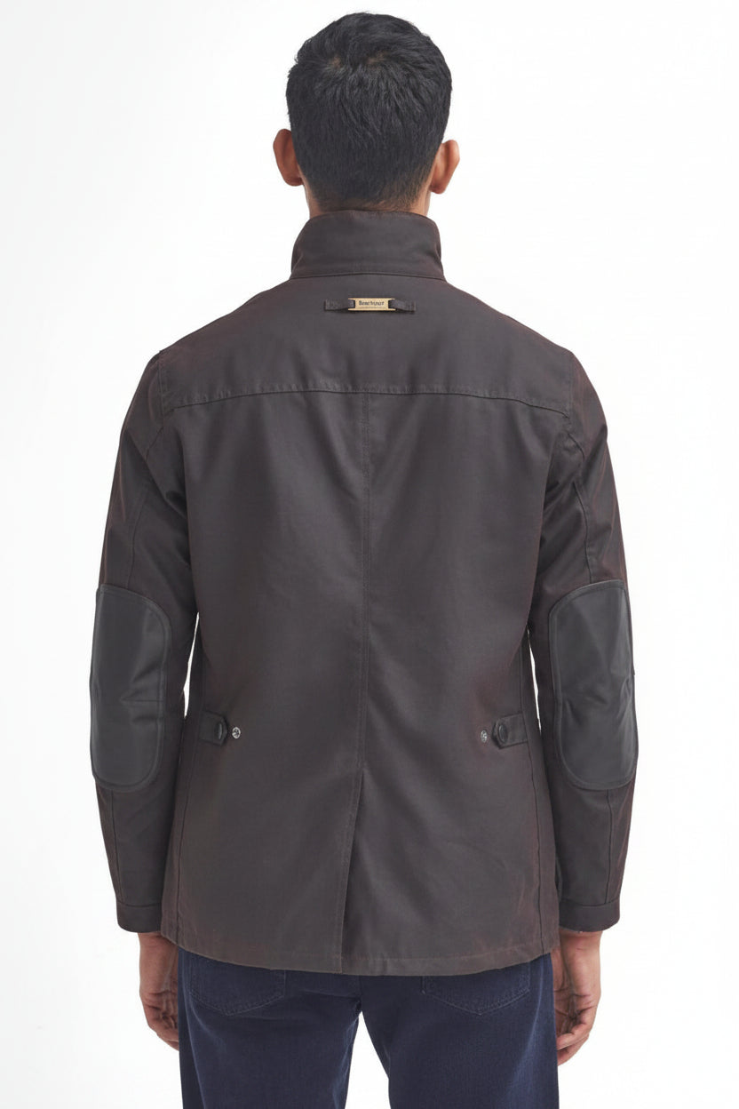 Men's Barbour wax jacket in dark brown, back view with stand collar tag and flap pockets.