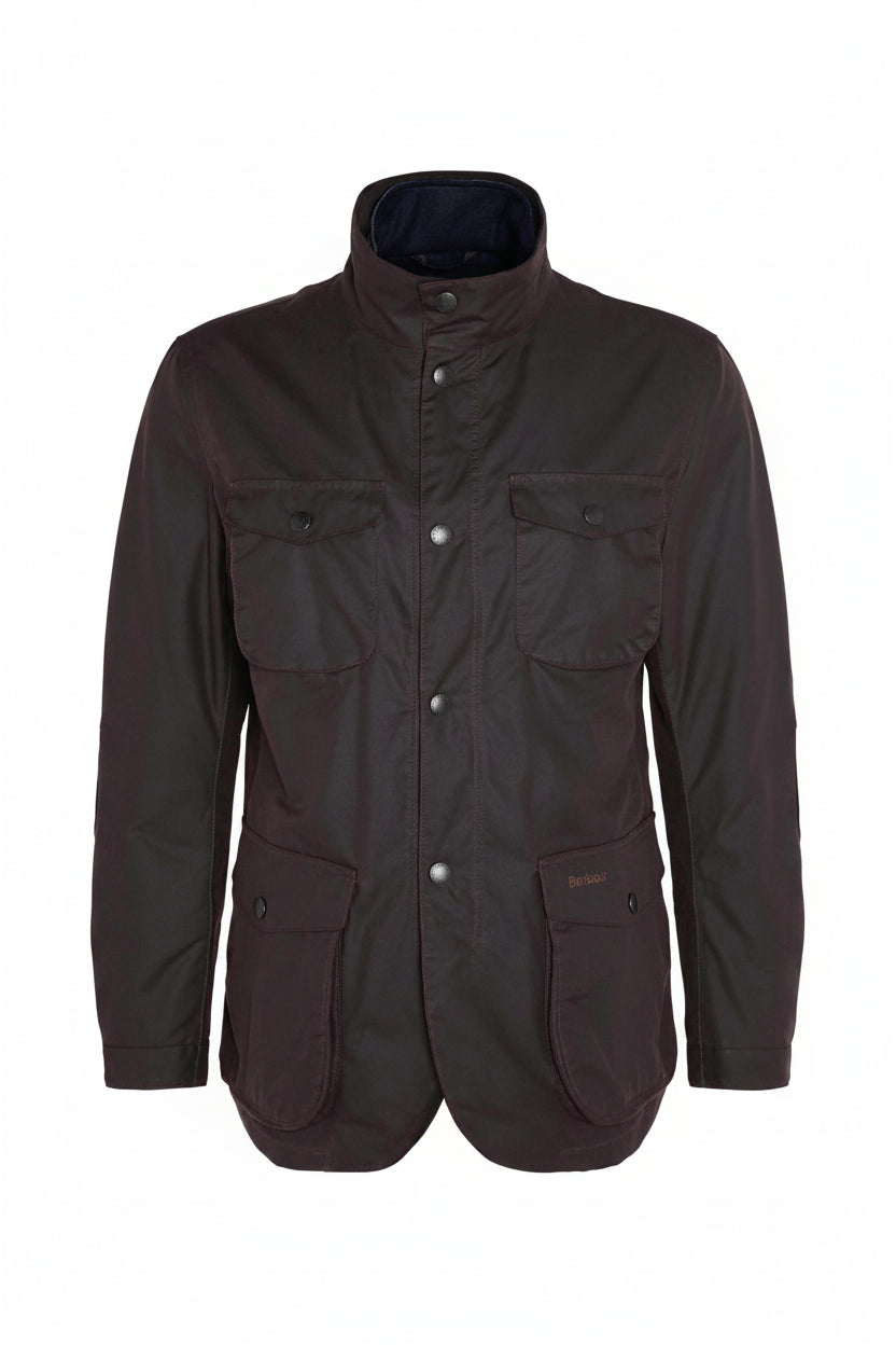 Men's Barbour wax jacket in dark brown with button front, chest flap pockets, stand collar.
