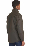 Men's olive wax jacket side view with button front and flap pocket