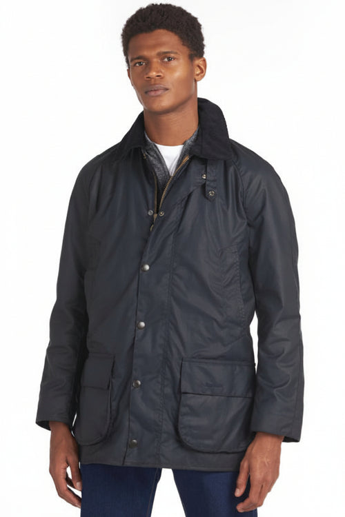 Navy men's wax-cotton coat with stand collar, concealed zip, and button front