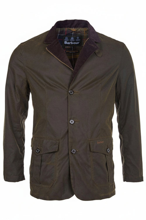 Men's olive wax jacket with button front, stand collar, and two flap chest pockets.