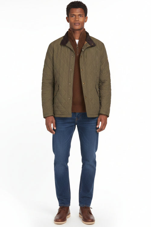 Front view of army green quilted jacket with stand collar and buttoned placket