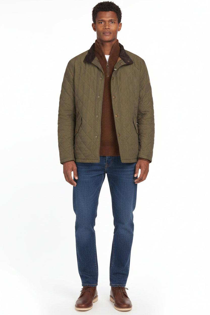 Front view of army green quilted jacket with stand collar and buttoned placket