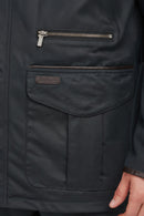 Navy wax cotton jacket interior pocket with buttoned flap and metal zipper