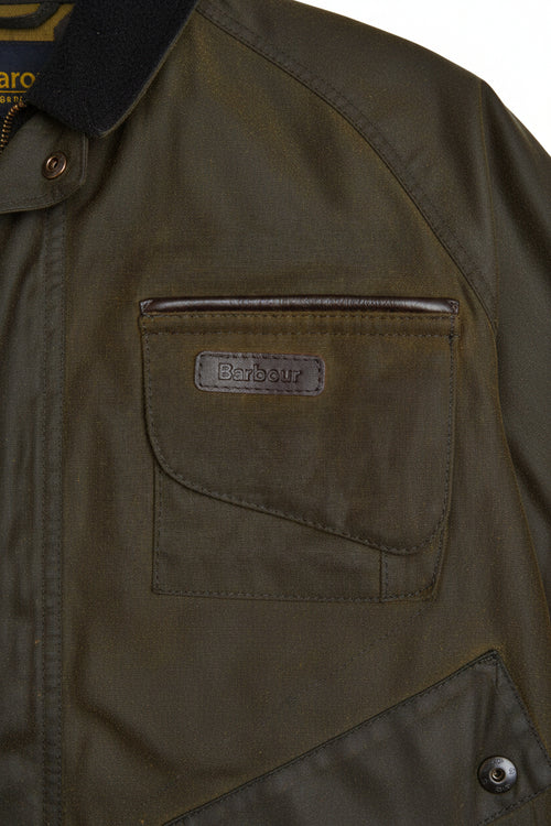 Olive wax cotton jacket with Barbour patch on chest pocket and snap buttons