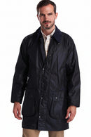 Men's navy wax jacket with stand collar, two flap pockets, button-down front