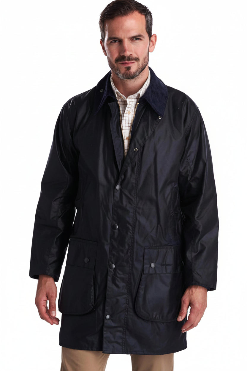 Men's navy wax jacket with stand collar, two flap pockets, button-down front