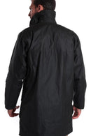 Men's navy wax jacket back view with long sleeves and curved hem