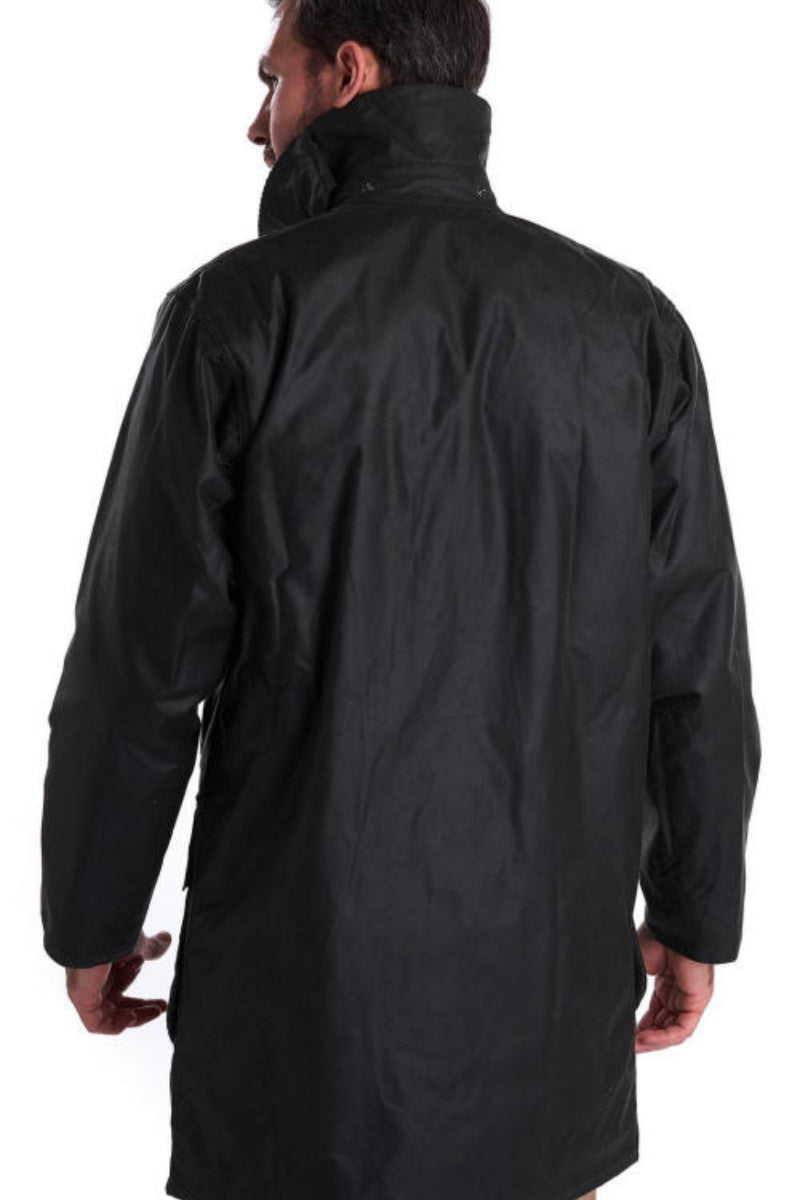 Men's navy wax jacket back view with long sleeves and curved hem
