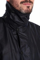Men's navy wax jacket with high stand collar and snap-button throat placket