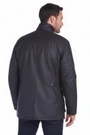 Navy wax jacket back view with center seam and button closure