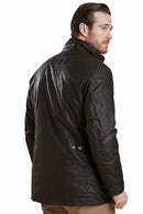 Men's Barbour wax jacket with stand collar, button front, dark waxed fabric; back/side view