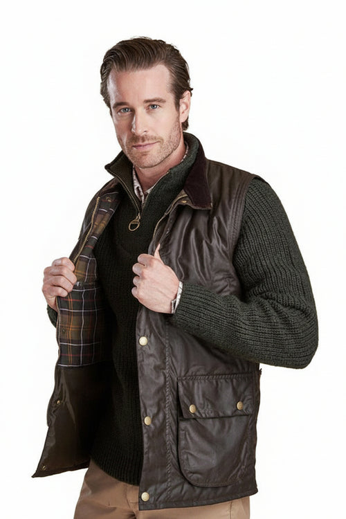 Waxed waistcoat with stand collar, snap front, and chest pockets, brown lining detail, dark olive
