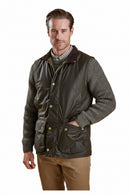 Men's waxed waistcoat with stand collar, snap buttons, and chest pockets, worn over knit sweater