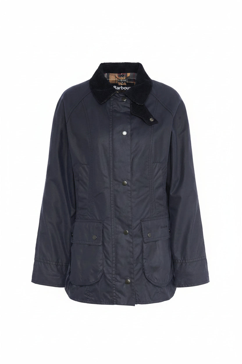 Navy women's wax Beadnell jacket with cord collar, button front, and patch pockets