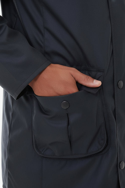Men's navy wax jacket side hand pocket with snap-button flap