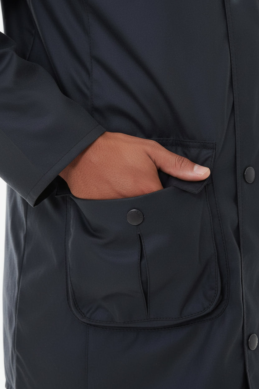 Men's navy wax jacket side hand pocket with snap-button flap