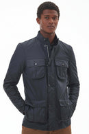 Men's navy wax jacket with stand collar, zip front, and flap chest pockets