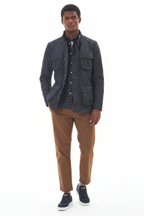Men's navy wax jacket with stand collar, button front, and dual flap chest pockets