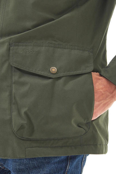 Men's olive waterproof jacket front pocket flap with brass snap and button placket