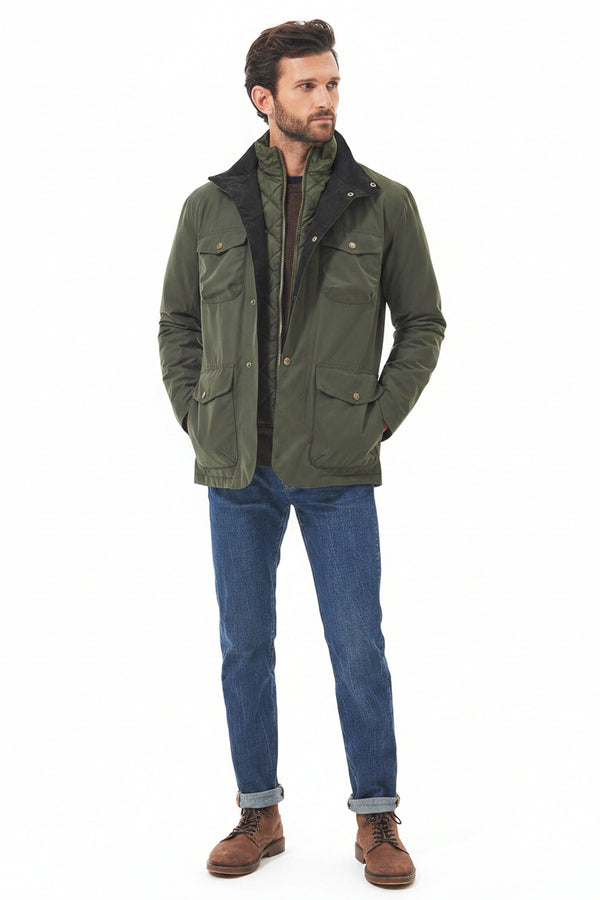 Men's olive waterproof jacket with button-front and flap pockets over denim