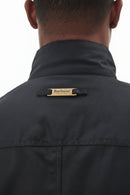 Men's black wax jacket back collar with Barbour logo tab