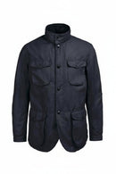 Men's black wax jacket in studio view with four flap pockets and button front