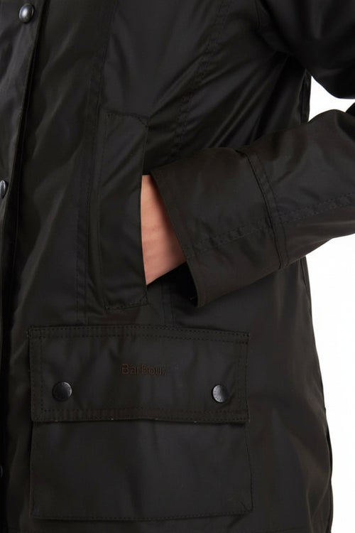 Dark olive jacket with sleeve detail and flap pocket with metal buttons.