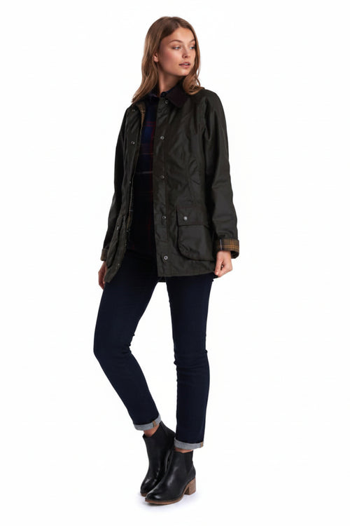 Women’s dark olive Beadnell-style jacket with button front and flap pockets.