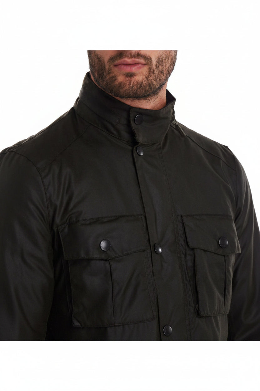 Black wax jacket close-up with stand collar and snap button placket