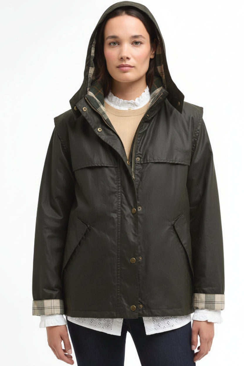 Barbour waxed jacket front with hood, gold-tone buttons, and plaid lining at cuffs.