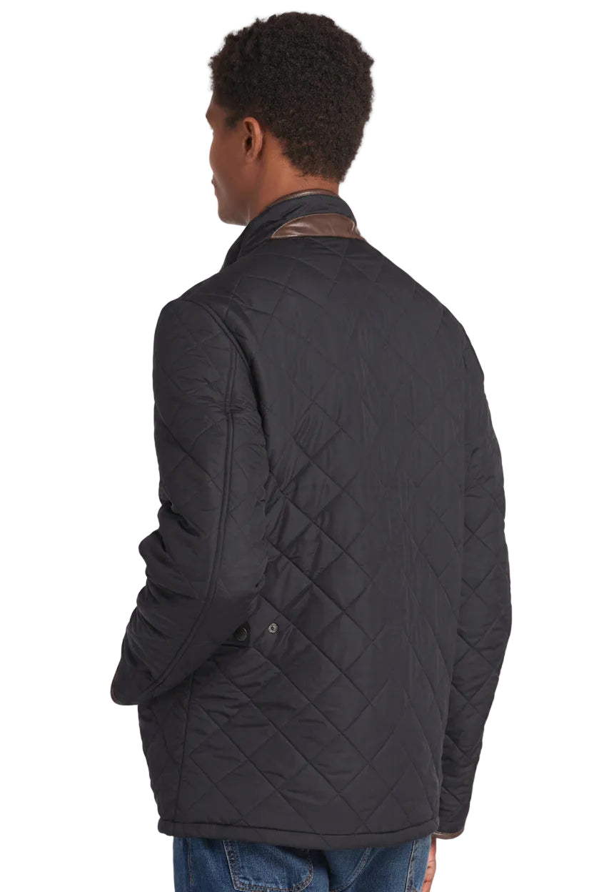 Barbour quilted jacket back view, dark navy diamond quilting and side pockets