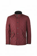 Burgundy quilted jacket with stand collar, button front, and side pockets