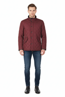 Burgundy quilted jacket with stand collar, button front, and zip pocket detail