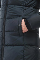 Black quilted jacket front panel detail with zip, snap button pocket, and sleeve cuff