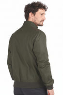 Olive waxed cotton jacket side view with ribbed collar and cuffs