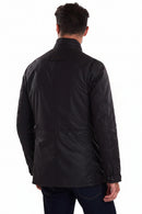 Back view of dark wax jacket with quilted yoke and snap pockets